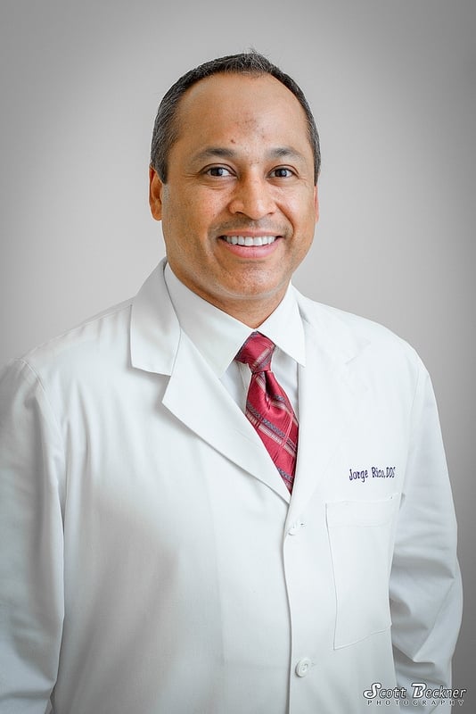 Dr. Jorge Rico - Dentist, smiling at the camera